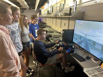 Student using flight simulator