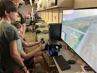 Student using flight simulator